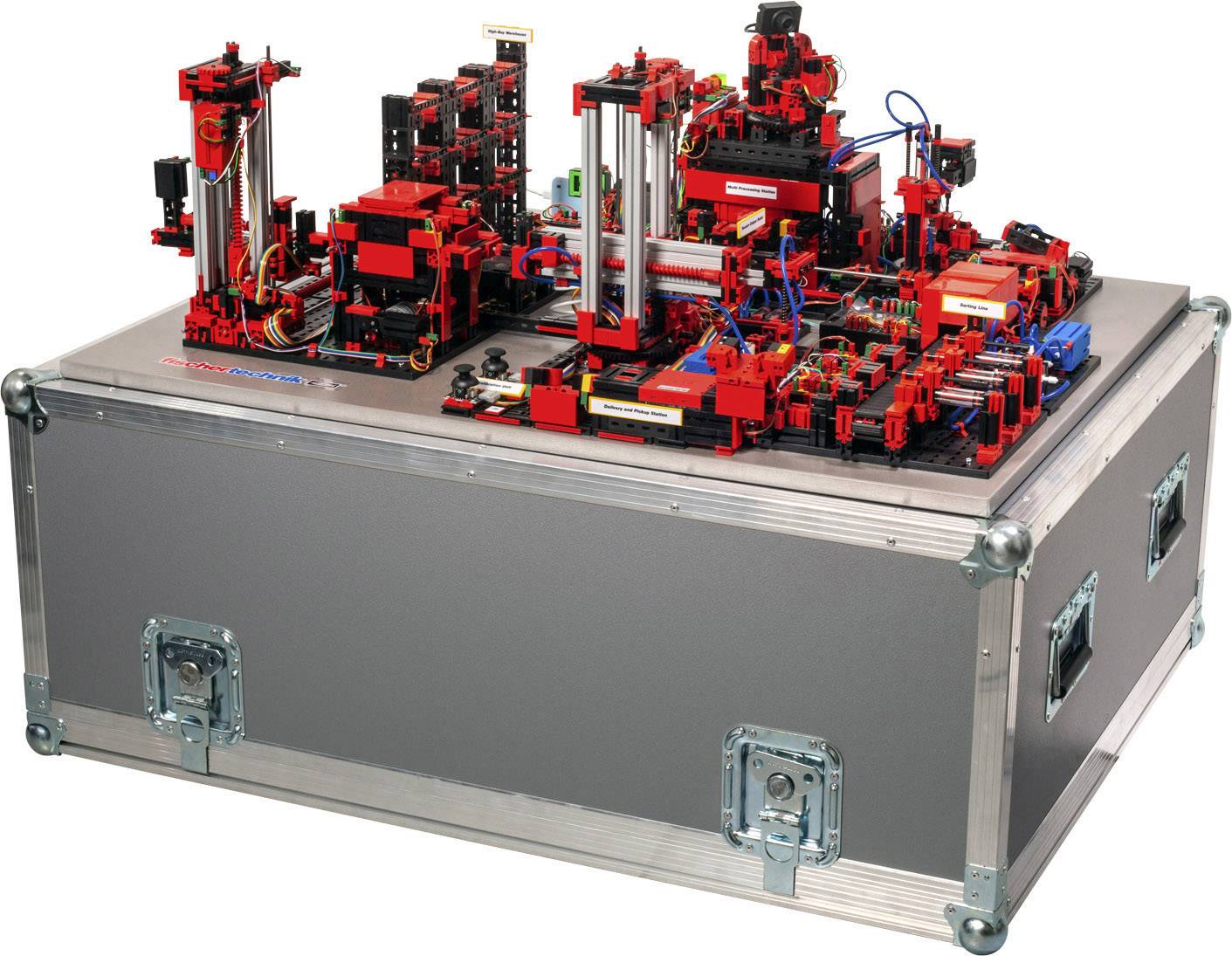 Model of an automated factory installation made of red components on a metal table; demonstrates production processes and mechanisms.