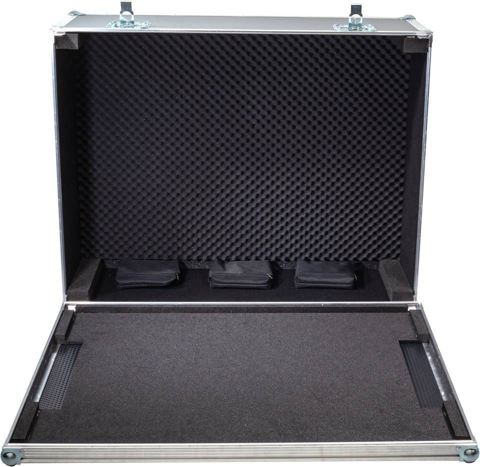 Open empty suitcase with foam interior lining and three recessed compartments for equipment or devices.