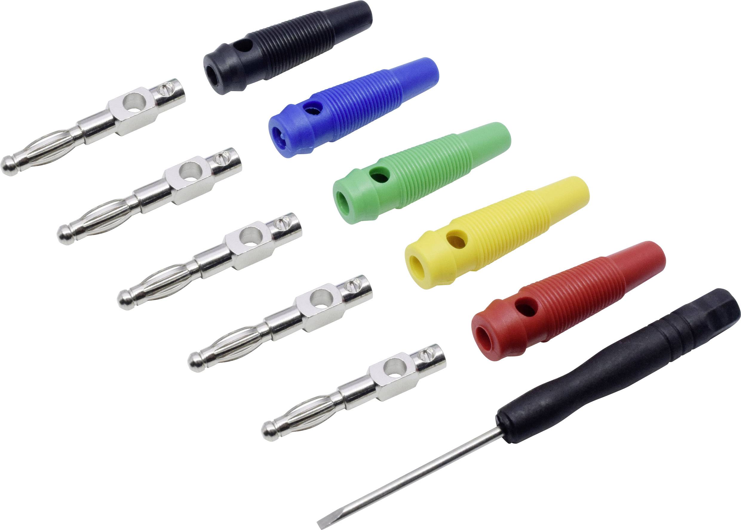 Coloured banana plugs and a black screwdriver blade lie side by side on a white surface.
