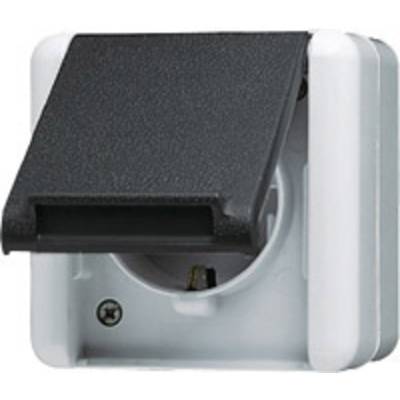 White outdoor socket with black cover, half open, wall-mounted. Suitable for outdoor use.