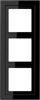 Black, rectangular 3-gang frame for light switches or sockets, with a smooth surface and glossy finish.