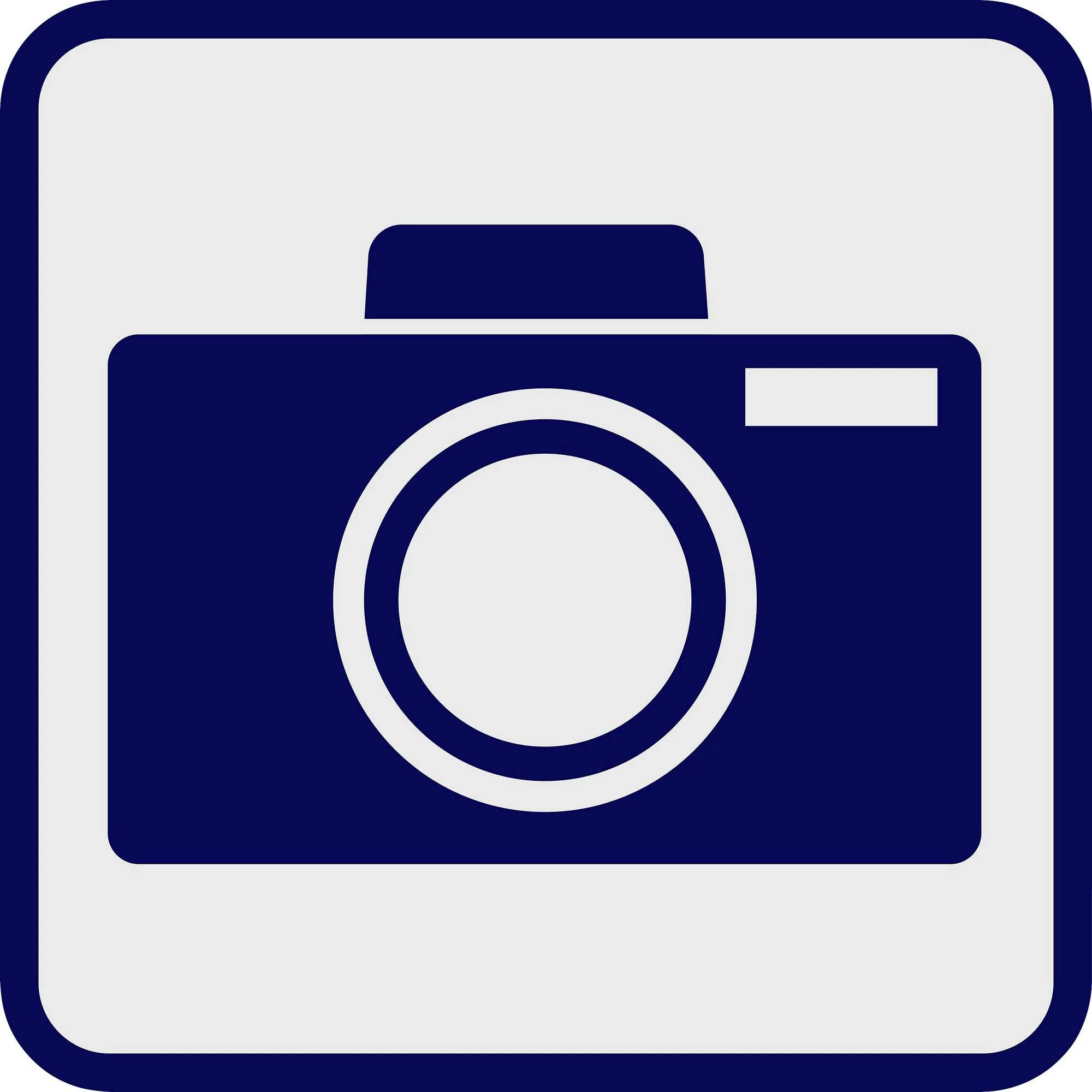 Camera symbol on a grey background.