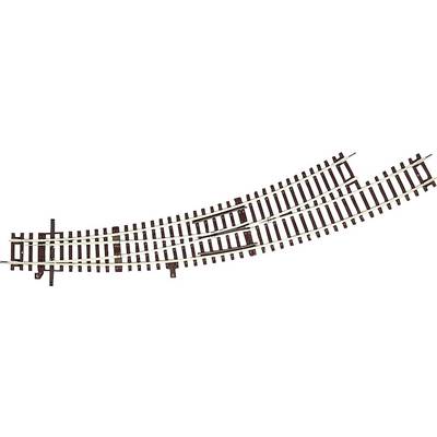 Metal railway tracks with a points (railroad switch) in the middle that branches to the left. The tracks are brown and white.