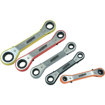 Four ratchet ring spanners in different colours (yellow, red, black, orange) are lying on a surface.