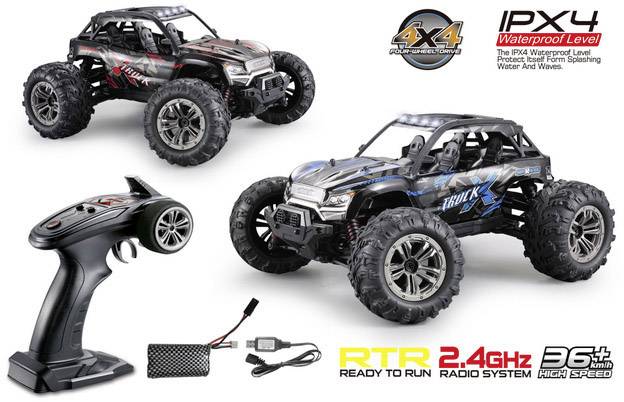 Two remote-controlled off-road vehicles with high ground clearance and robust tyres. Beside them a remote control and accessory parts.