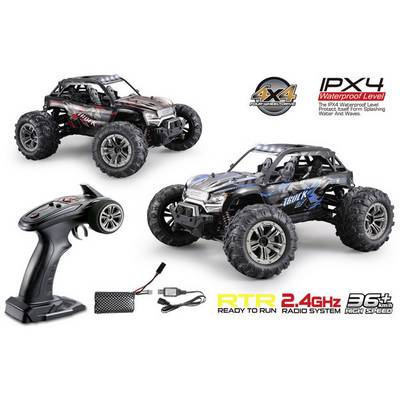 Two remote-controlled off-road vehicles with high ground clearance and robust tyres. Beside them a remote control and accessory parts.