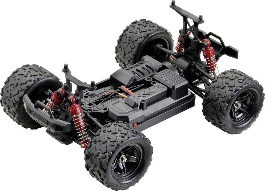 Remote-controlled car chassis with large off-road tyres and shock absorbers, without bodywork, reveals the mechanics and suspension.
