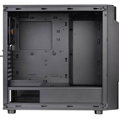 An empty PC case with its interior exposed, revealing mounting brackets for components and a fan on the rear wall.