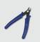 Pliers with blue handles on a grey background. Suitable for cutting wires or for electronic work.