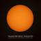 A orange solar disc against a black background, with a small sunspot. Text: 'Thousand Oaks Optical - SolarLite Film'.