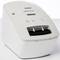 White label printer with buttons and paper output slot, suitable for printing labels in office or home environments.