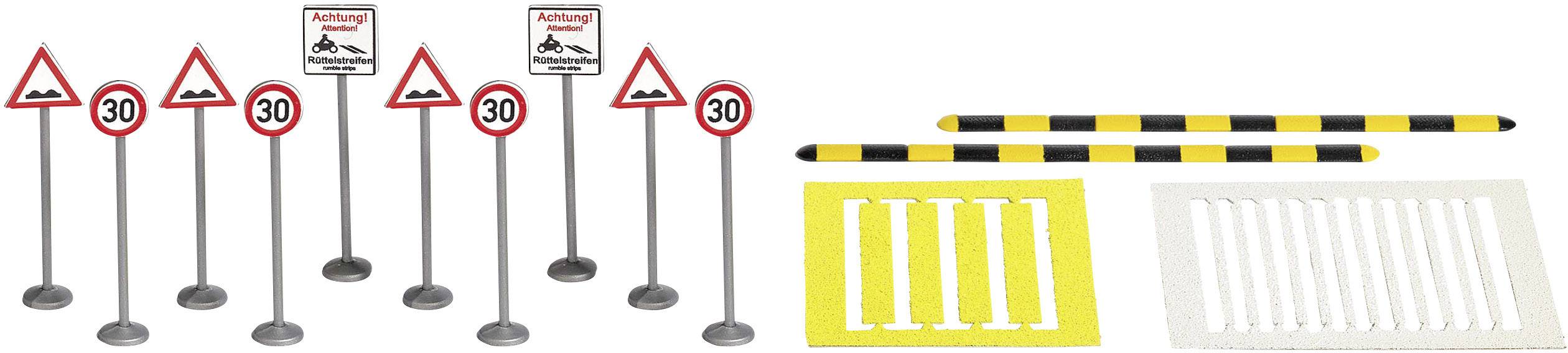 Street signs and traffic obstacles in miniature format, including speed limits and obstacle warnings.