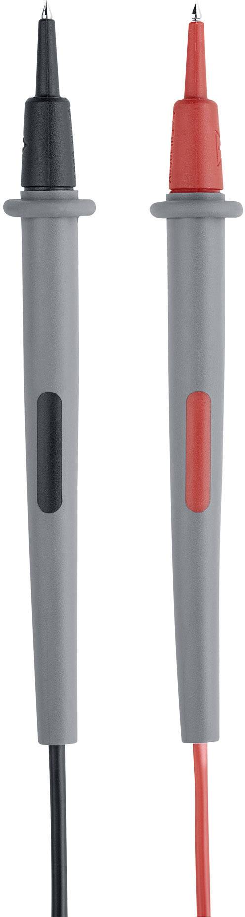 Two test probes, one black and one red, stand upright next to each other. They are used for measuring voltage and current.
