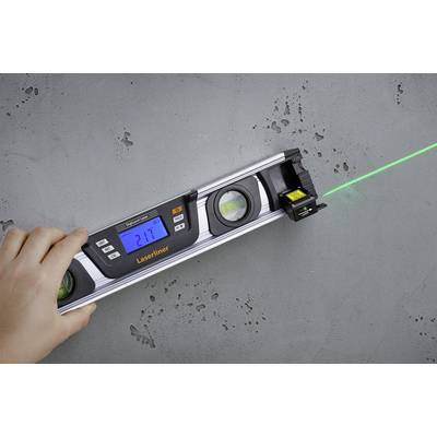 'A hand is holding a digital spirit level with laser, which is being aligned against a concrete wall. The laser beam is projecting a green line.'