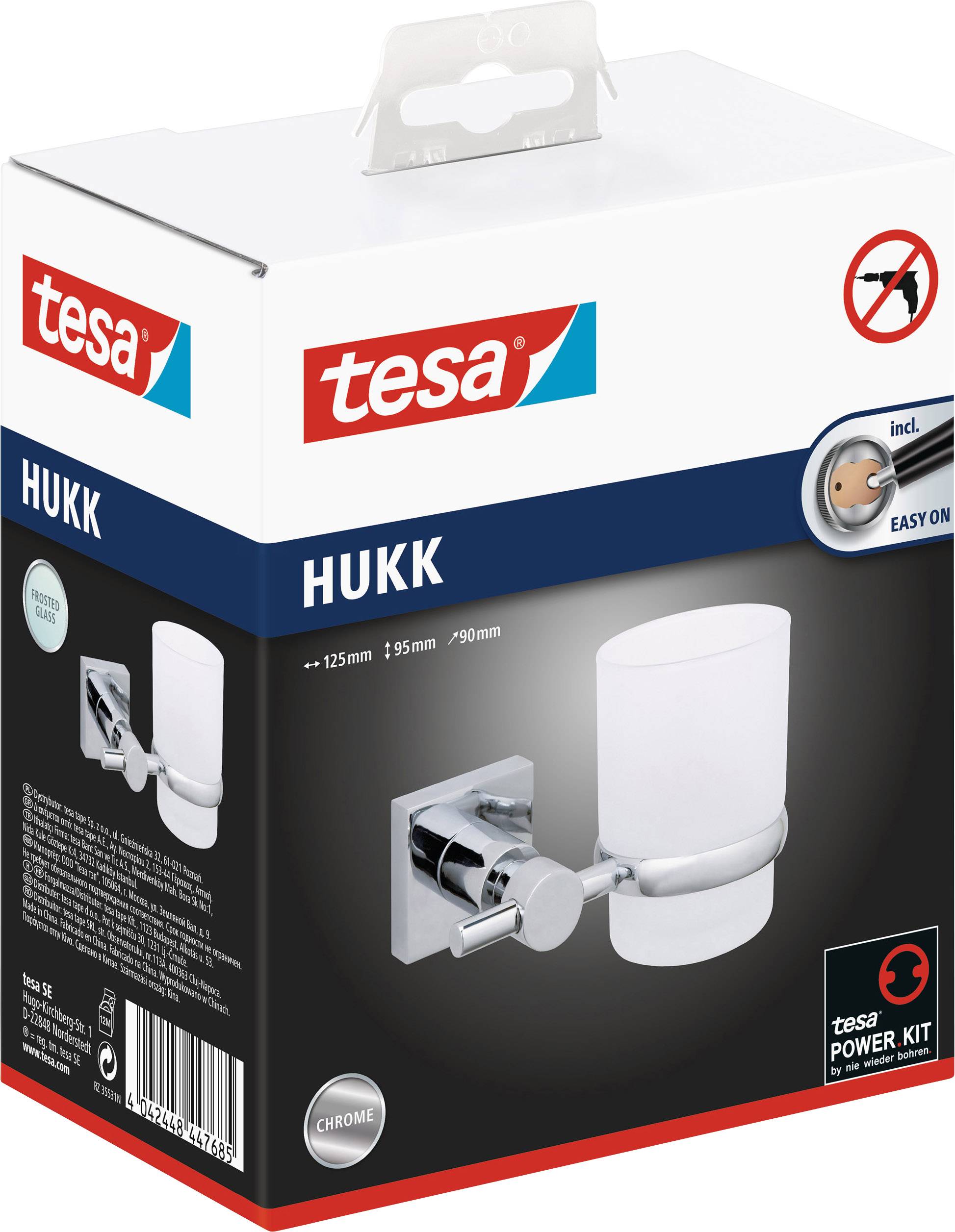 Packaging for a Hukk toothbrush holder by Tesa, including the Power.Kit mounting system, showing an image of the product in chrome finish.