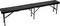 Black folding bench with metal legs, fully extended. Ideal for additional seating at outdoor events.