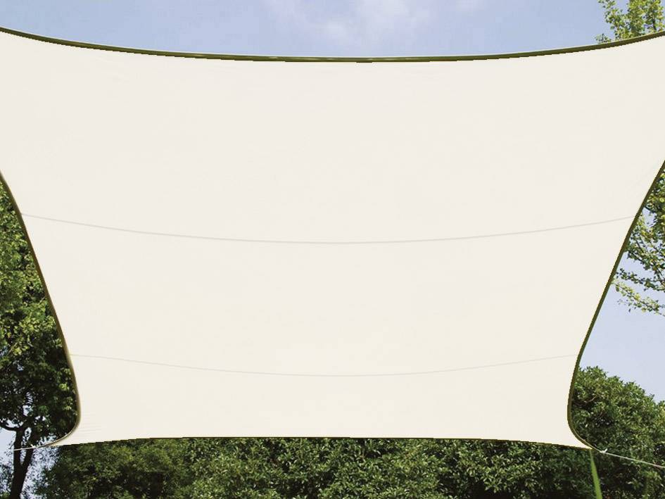 A light-coloured sun canopy is stretched over green foliage, creating a shaded outdoor area.