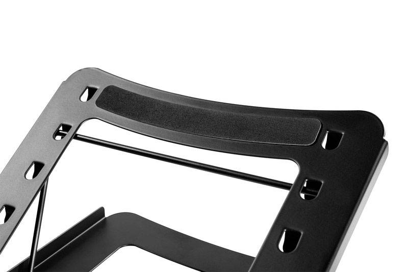 Metal laptop stand with ventilation slots and adjustable angle in close-up, for ergonomic use.
