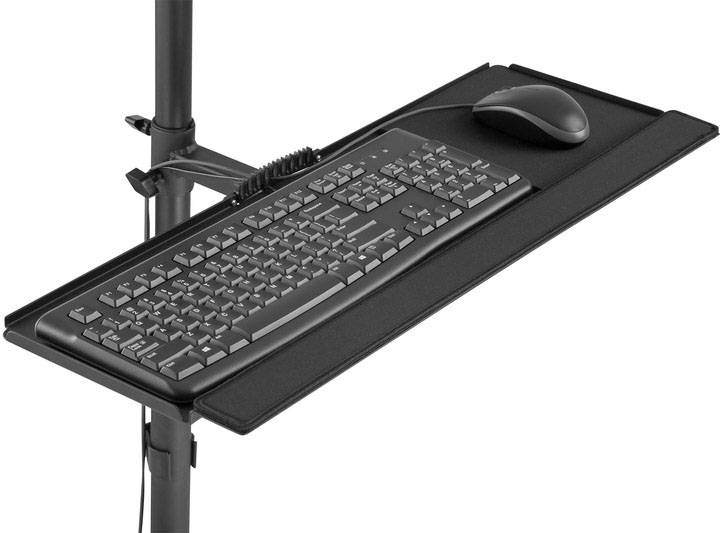 A black keyboard and mouse on a black tray mounted to a desk.