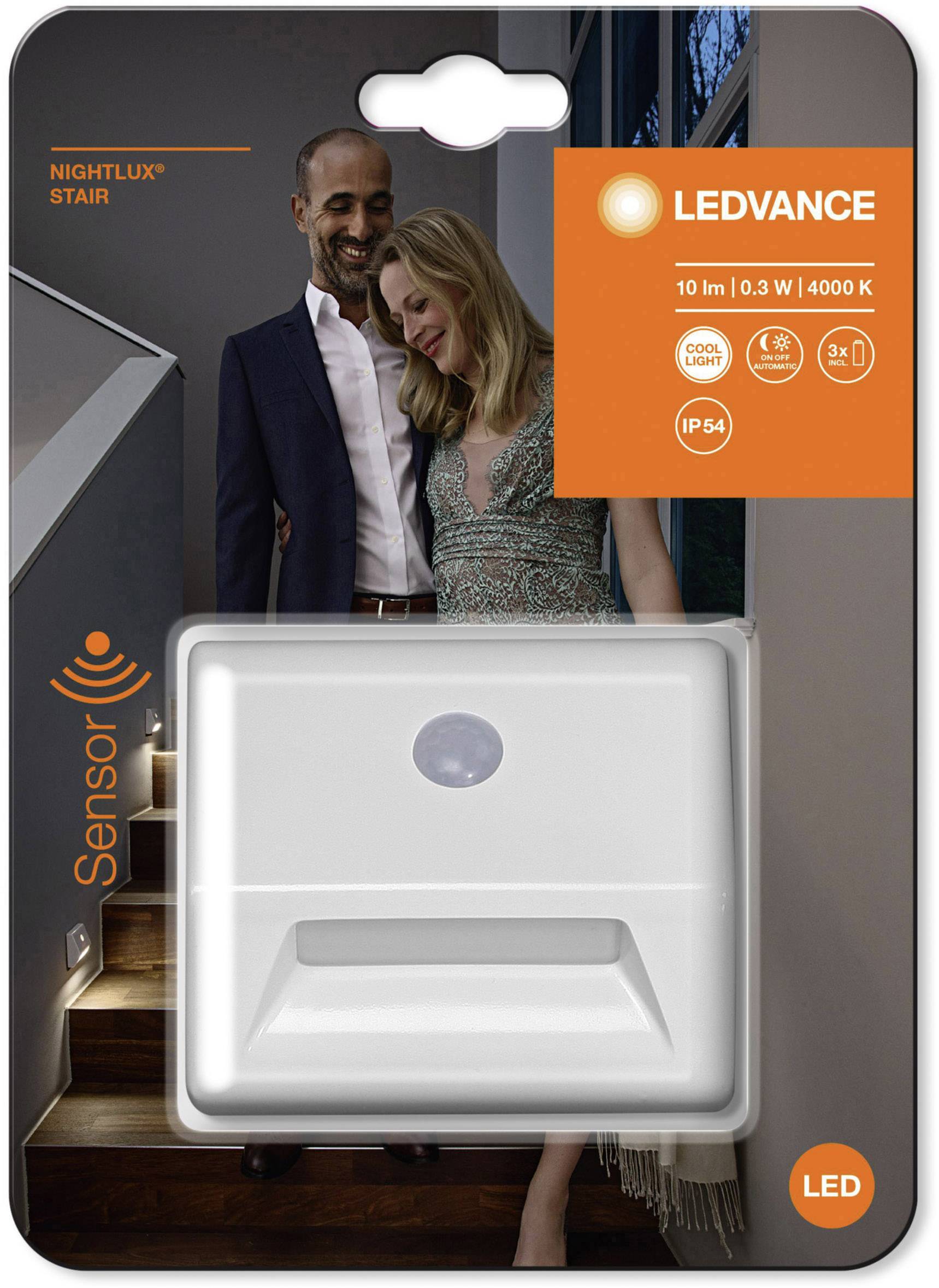 A couple descends the stairs, illuminated by an LED sensor night light. The packaging emphasises energy efficiency and IP54 protection rating.