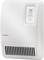 A white electric wall-mounted radiator with a digital control panel displays a temperature reading of 23 degrees Celsius.
