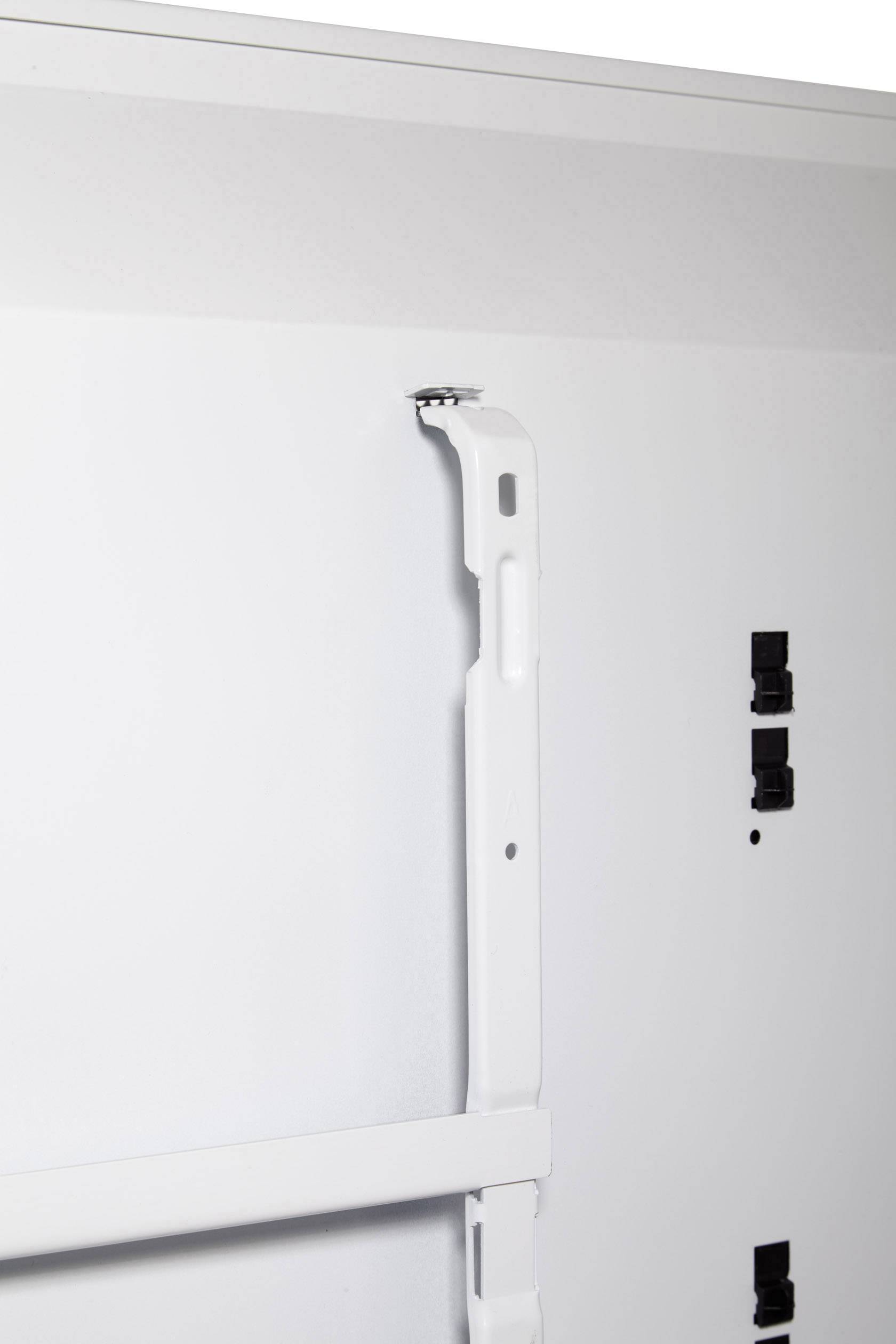 A white metal frame with multiple hooks and mounting fixtures on the wall for installing an object indoors.