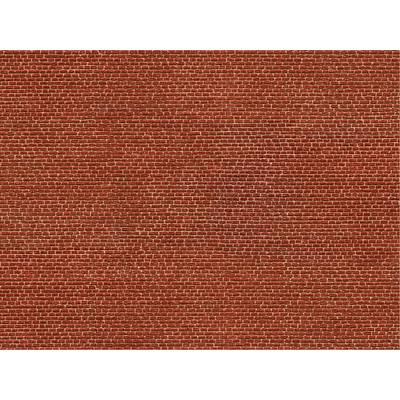 Red brick wall with a uniform, detailed pattern.