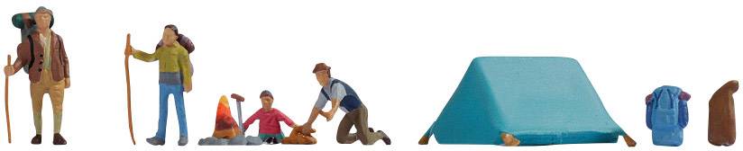 Miniature camping scene with figures erecting a tent, sitting around a campfire, and carrying hiking rucksacks. Outdoor activity.