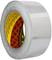 Roll of silver adhesive tape with red inner core on a white surface.