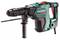 A green electric hammer drill with a black handle and red switch, suitable for heavy-duty drilling work.