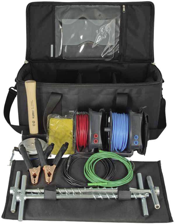 Open black tool bag with cable reels in red, blue and green, earthing clamps, hammer and earth probe.