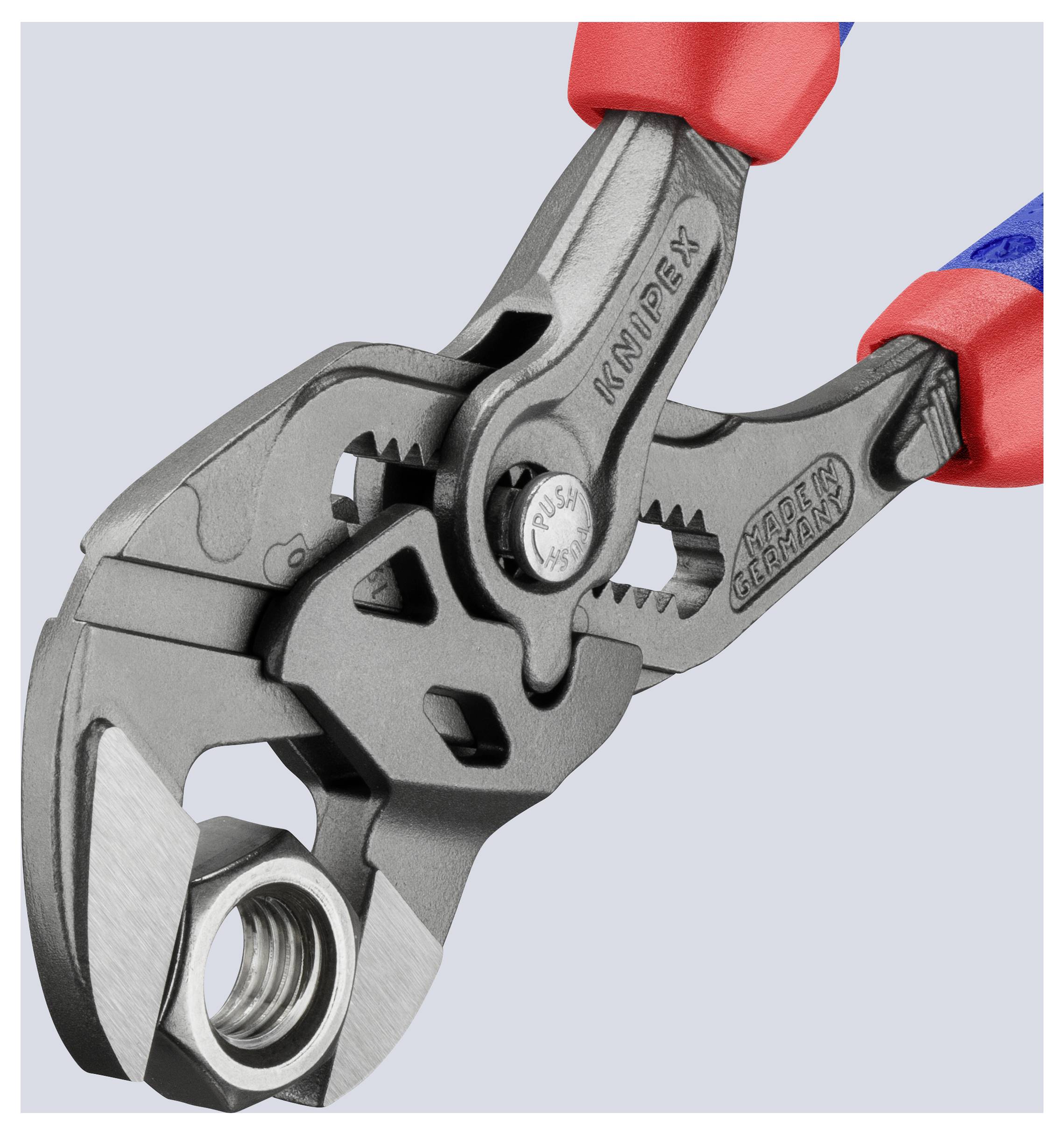 A close-up image of pliers gripping a metal nut, showcasing the tool's precision grip and robust construction.