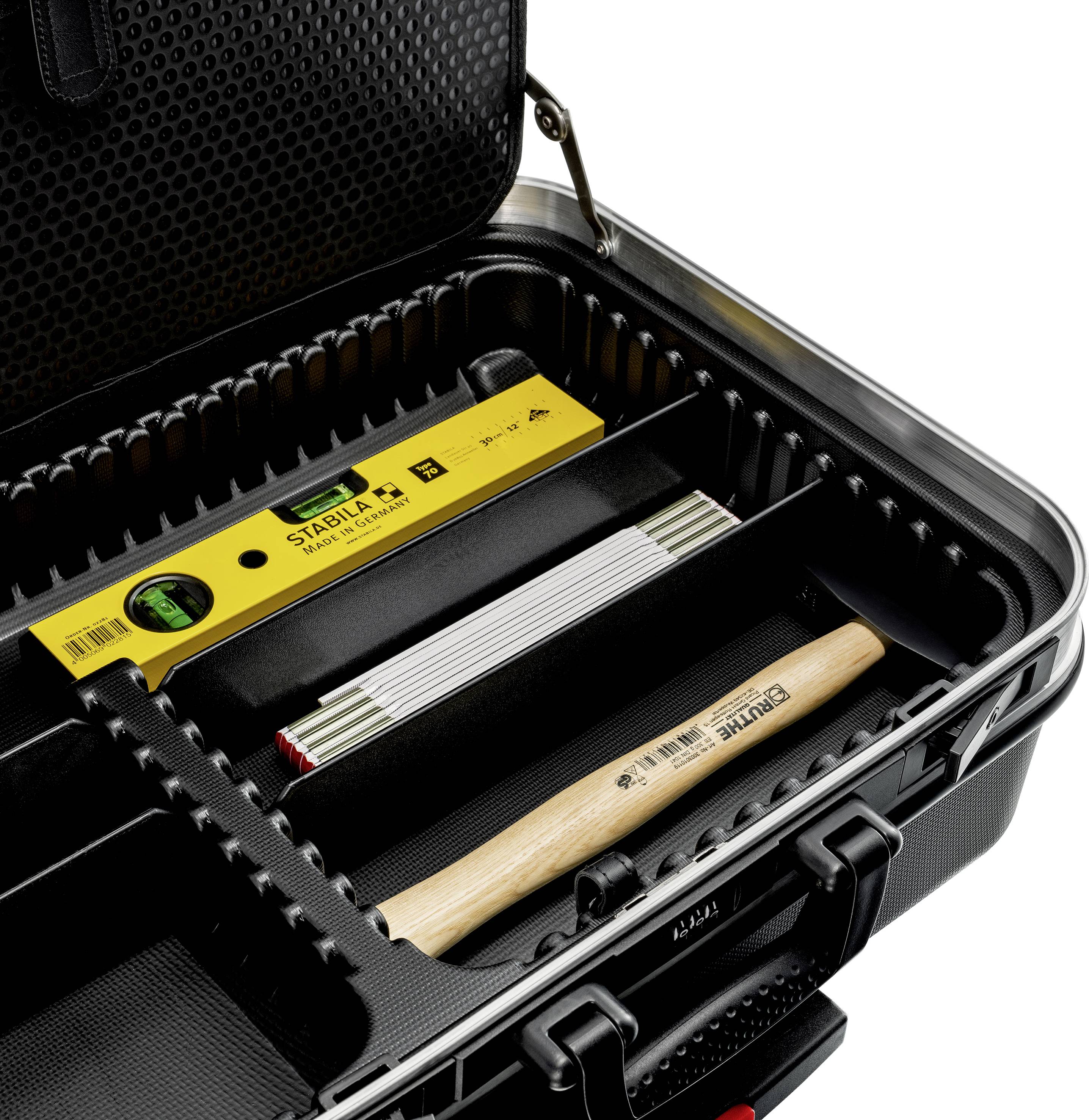 'An open black case with foam compartments contains a spirit level, a folding ruler, and a hammer.'