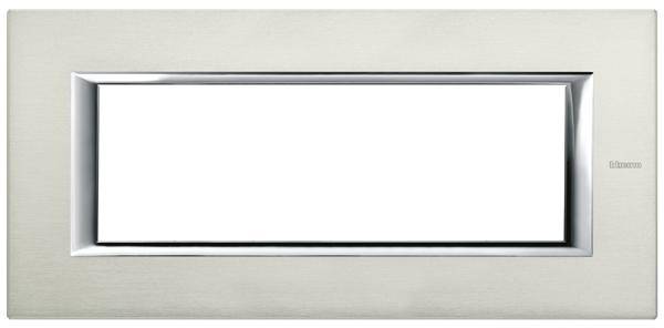 Rectangular letter slot made of brushed metal with a polished edge. Primarily used as a decorative feature on doors.