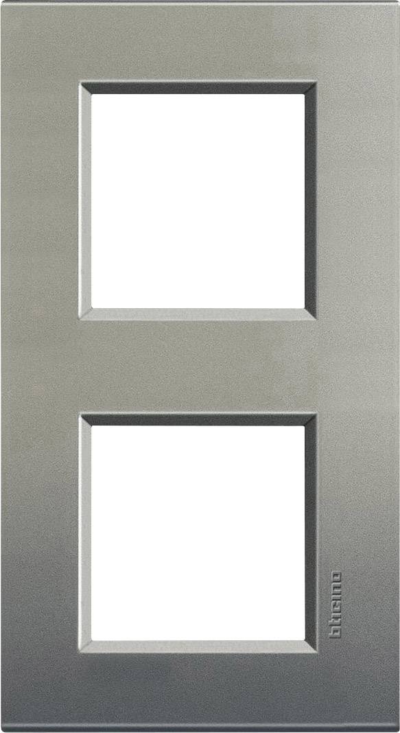 Grey double plastic frame with two rectangular cut-outs positioned one above the other; suitable for sockets or light switches.