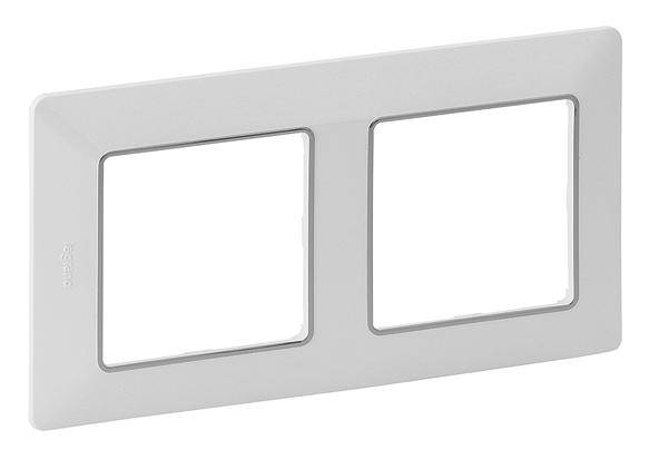 White double frame cover for electrical installations with two square cutouts. Suitable for sockets or switches.