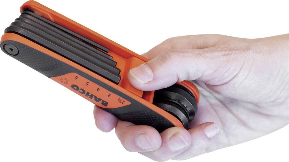 A hand is holding an orange and black tool set with multiple Allen keys.