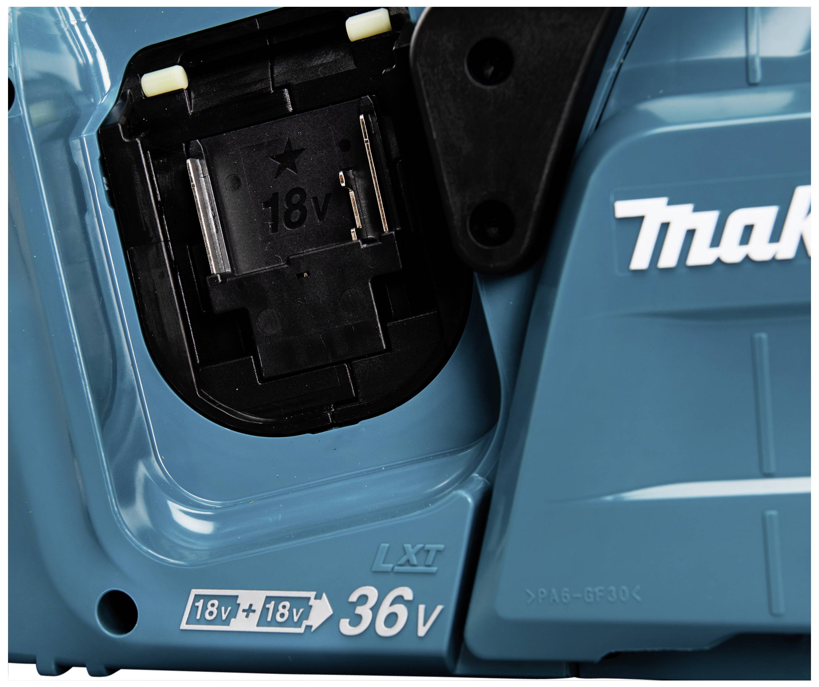 Battery compartment of an electric tool with text '18V + 18V = 36V' indicating power capacity.