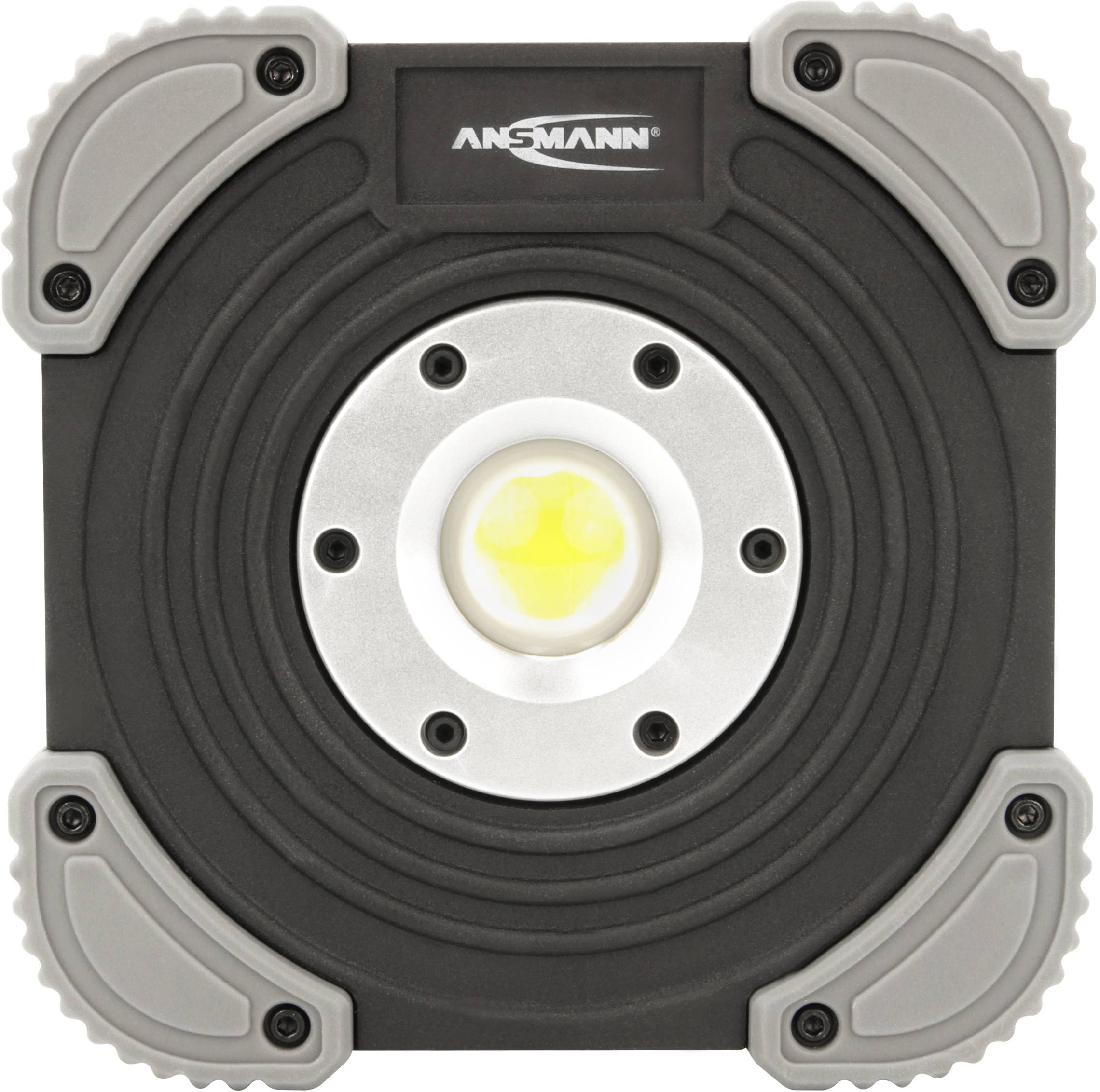 The image depicts a square LED work light with a central yellow light, surrounded by black and grey elements.
