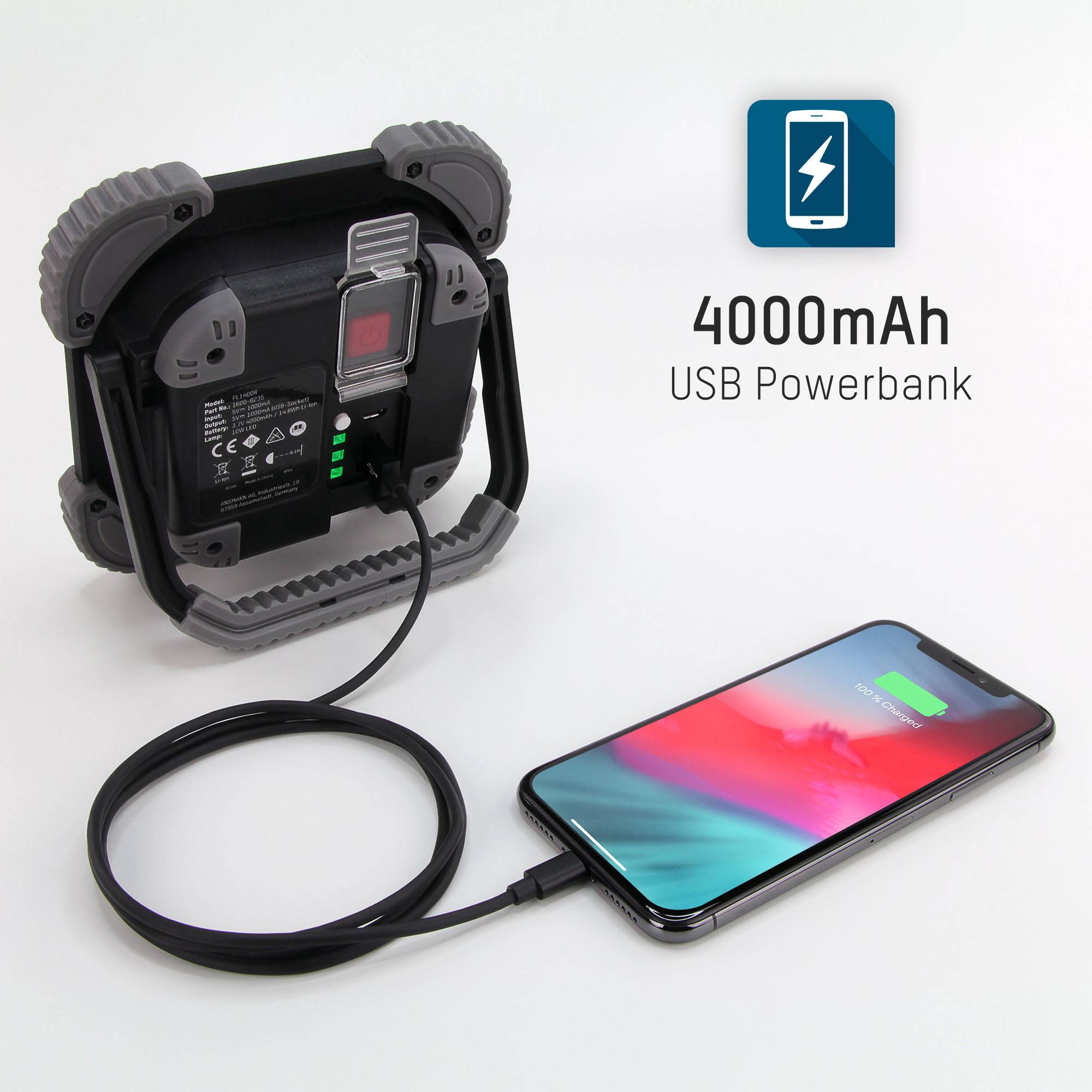 A power bank with 4000mAh charges a smartphone, connected via a USB cable.