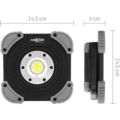 Portable LED lamp with dimensions: 14.5 cm width, 4 cm depth, 14.5 cm height. Circular light source in the centre.