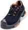 Black safety shoe with orange details, robust design, reinforced toe cap and high sole, ideal for workplace protection.