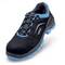 Black safety shoe with blue trim and blue sole, brand 'Uvex', suitable for workplace protection and outdoor activities.
