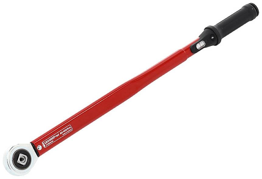 Torque wrench with a red handle and black head, a tool for precise torque measurement when tightening bolts and nuts.