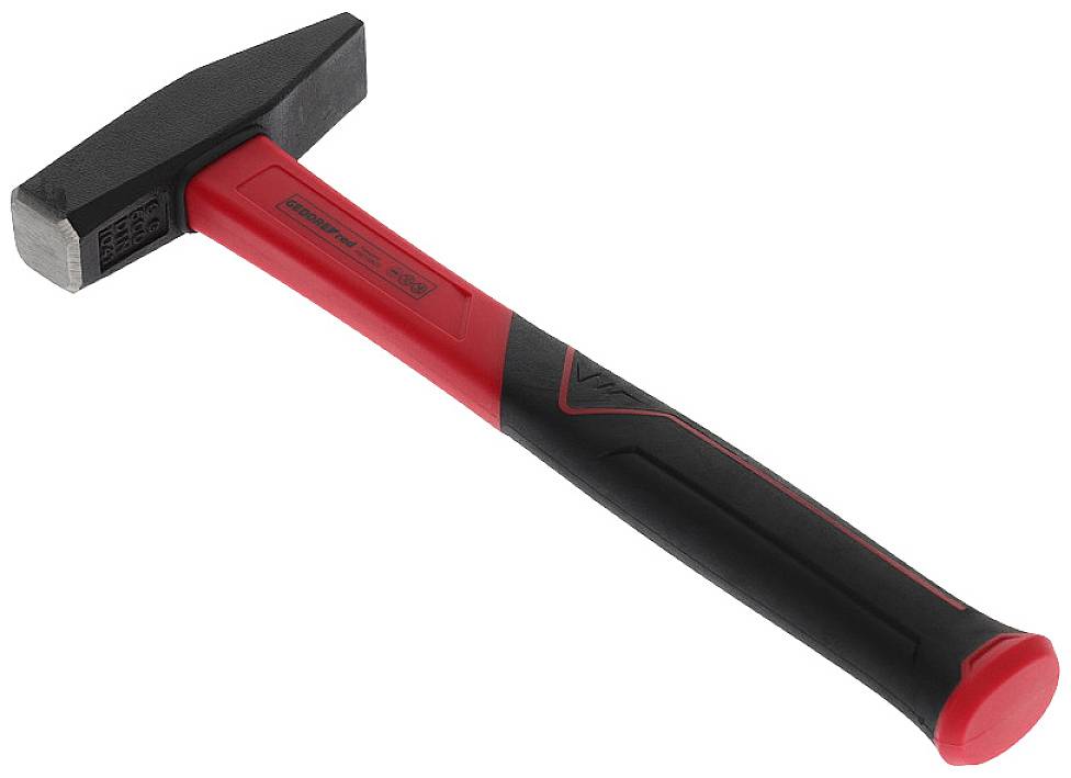 A black and red small hammer with a rubber grip lies on a white surface. Ideal for striking metal or securing.