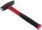 A black and red small hammer with a rubber grip lies on a white surface. Ideal for striking metal or securing.