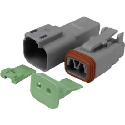 Grey electrical connector with two green covers, one rectangular, one angular, on a white background.