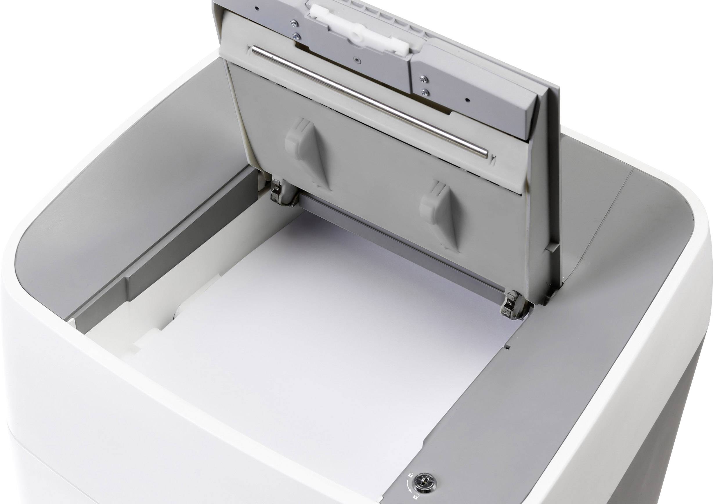 An open printer showing the paper tray and internal mechanism.