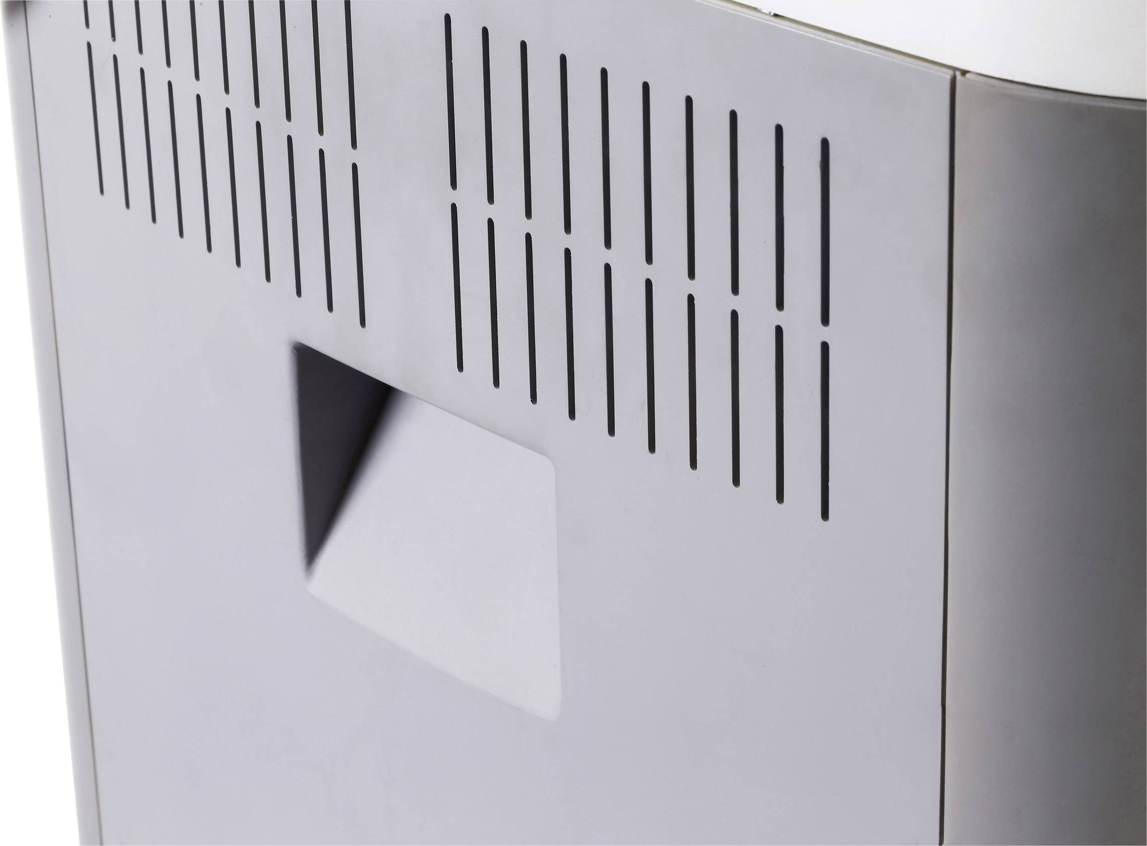 Air purifier in close-up with ventilation slots and modern design.
