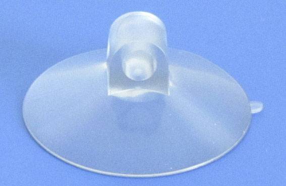 A transparent suction cup mount on a blue background. Ideal for attaching objects to smooth surfaces.
